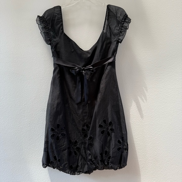 Black Cocktail Bubble Dress with cut out flower design on bottom - Picture 3 of 8